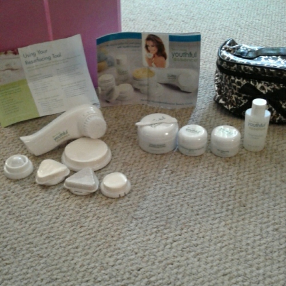 Youthful essence microdermabrasion system